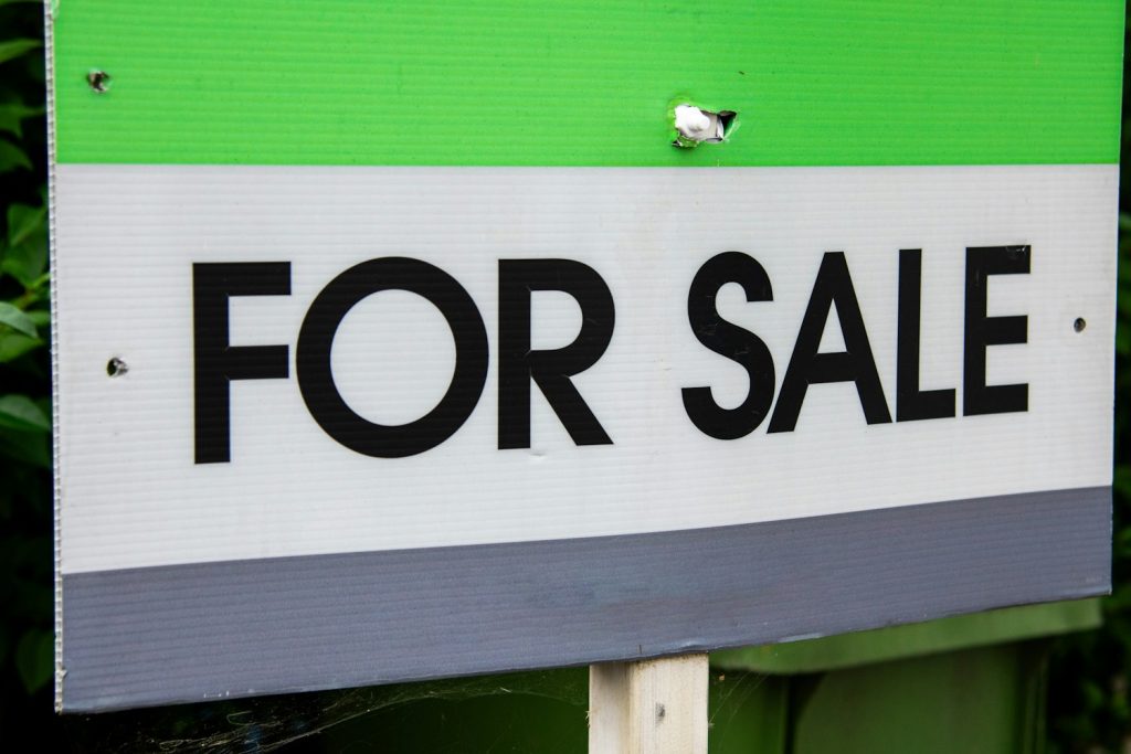 Close-up of a generic For Sale yard sign